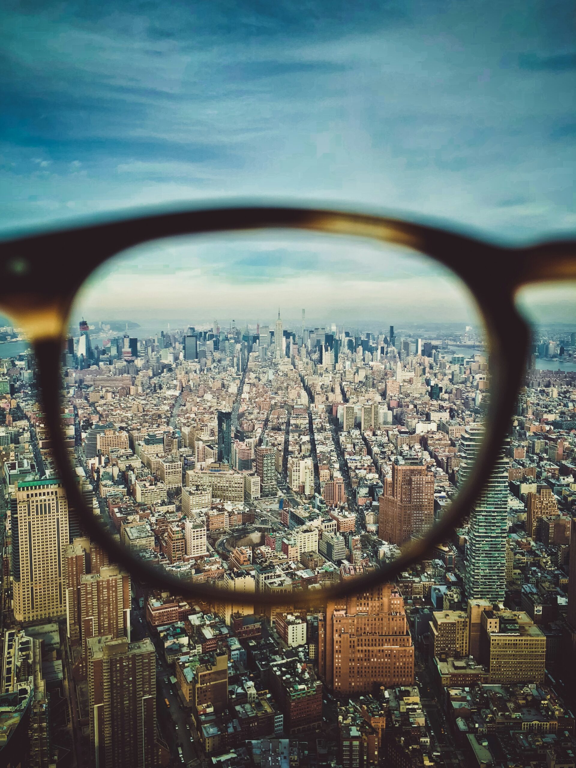 City buildings on eyeglasses view