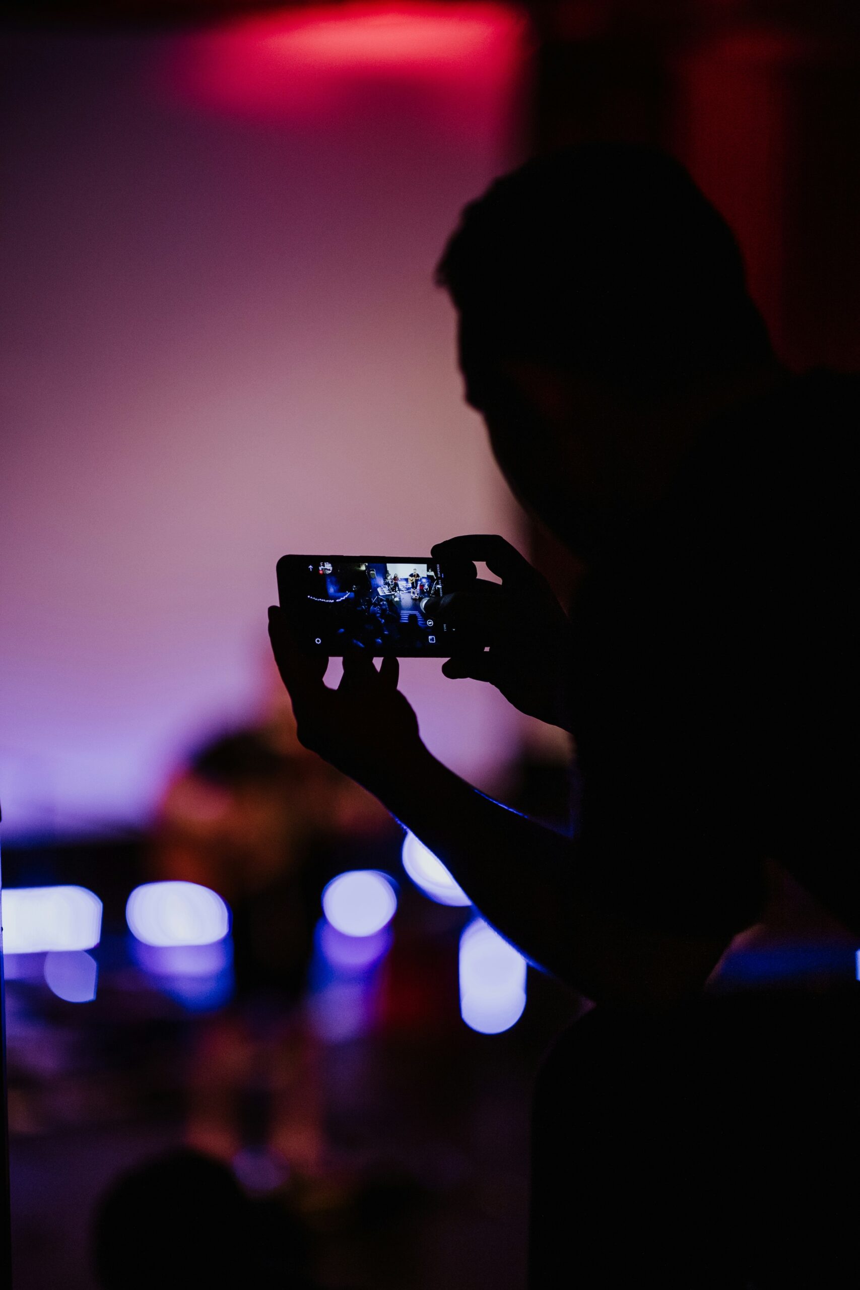 Person holding smartphone with turned-on screen