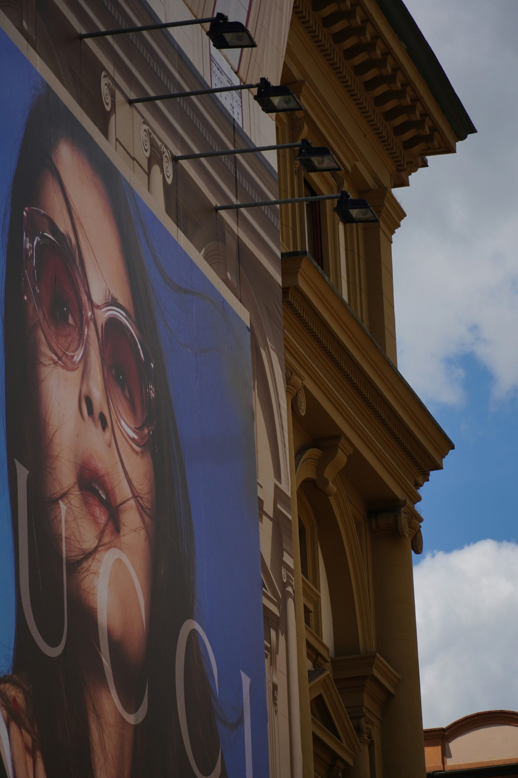 A large advertisement on the side of a building